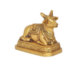 Brass Nandi bull statue, seated pose with engraved saddle details on square base