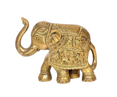 Brass elephant figurine, close side view with ornate patterned body, 4 in height