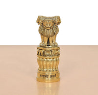 Bronze Ashoka Stambh front view with lion figure, ringed base, and Devanagari band.