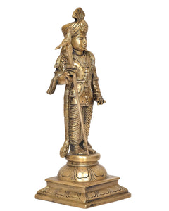 Golden brass Murugan standing statue, profile view holding spear, home pooja decor