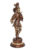 Brass Krishna playing flute idol statue, angled view with detailed back ornament