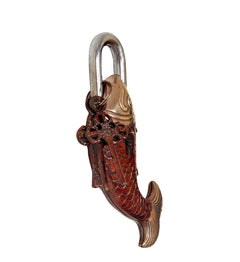 Fish-shaped decorative padlock, side view with red scales and brass fin tail