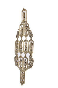 Brass Dashavatara wall hanging from front view with multiple framed deity statues