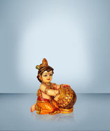 AONA resin Laddu Gopal makhan chor idol, seated with butter pot, ornate details.