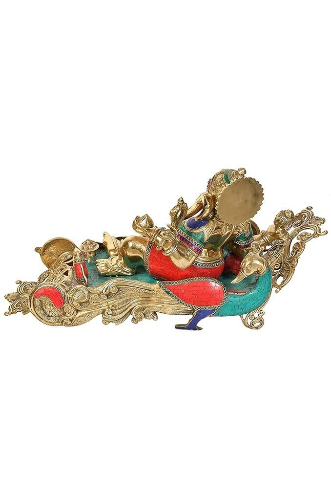 Brass Ganesha Relaxing On Peacock singhasan (Width: 32.2 inches)