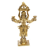 Front view gold brass deity-style standing lady diya holder with eight bowls atop arms