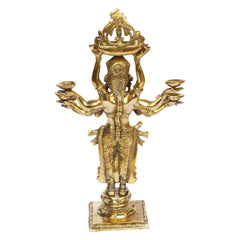 Front view gold brass deity-style standing lady diya holder with eight bowls atop arms