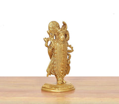 Shreenathji brass statue back-left view, decorated garments and stacked ornament details
