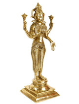 Brass standing Lakshmi goddess figurine on square pedestal, ornate jewelry