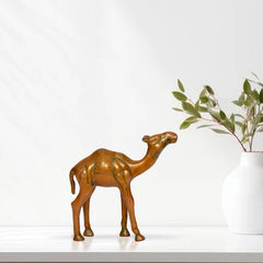 Brass camel figurine standing, ornate embossed details, decorative home decor