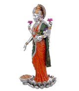 Side profile Lakshmi deity statue, silver-plated resin with orange and green sari