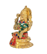 Brass Lakshmi idol statue, green top and red skirt, side view with curved arms