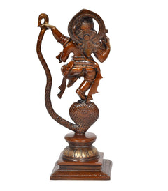 Rear view of dancing Lord Ganesha on serpent Shesha idol, bronze-brass tone