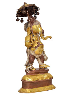 Brass Ganesha idol profile, holding parasol above head, ornate arms and waist details