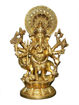 Brass Ganesha idol with eight arms, seated on pedestal, 11 inch