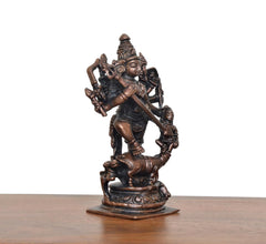 Copper Mahishasura Mardini deity statue, 5-inch, side view with raised weapon arm
