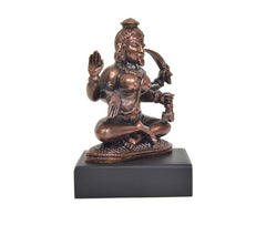 3-inch copper Mahakaali Mata idol, angled view with folded legs on base