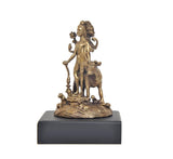 Gold-tone panchaloha deity idol on black base, side view with raised hand