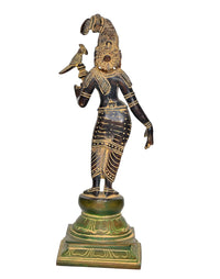 Brass Hindu goddess idol with halo motif and parrot, angled view