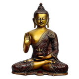 Seated brass Buddha idol, golden face, blessing hand raised, ornate robe, 10 in