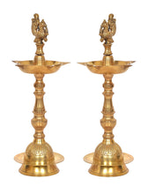 Brass peacock oil lamp stand set of 2, side view showing tall scalloped base
