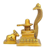 Gold brass Shiv linga with Nandi and raised hooded serpent design, side view