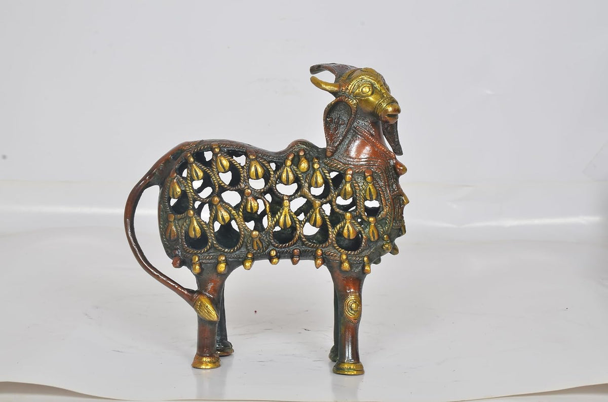Brass Nandi bull statue with ornate decorative body and raised horns