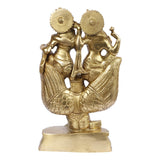 Brass Lakshmi and Vishnu on Garuda idol, detailed back view with halo discs
