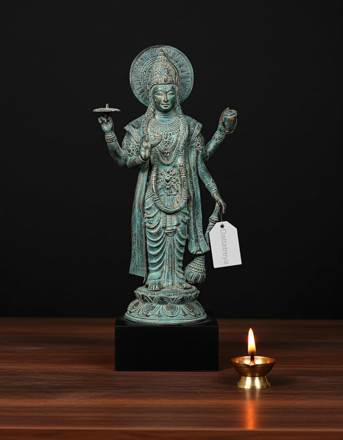 Standing bronze Lord Vishnu idol, turquoise-green patina, raised hands and halo