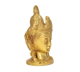Brass Tara Devi head statue in profile, textured crown and earrings, calm expression