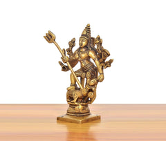 Brass Durga idol side view, raised trident held upright, many arms, 5 inch