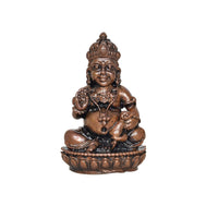 Copper Kuber statue, 2-inch seated deity with detailed crown and jewelry, bronze tone