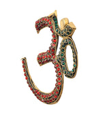 Brass OM wall hanging with gold-tone frame, red gems and teal inlaid border