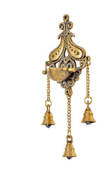 Brass wall diya with central oil bowl, three hanging bell cones and long chains