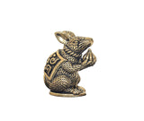 Brass mini mouse idol statue in seated pose, ornate armband patterns visible