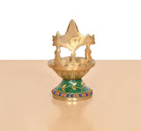 Brass Tirupati Balaji diya (6 inch) from behind; green base with jeweled bead border.