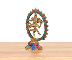 Brass Natraj Lord Shiva idol side view with multicolor halo and patterned base