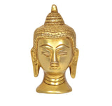 Brass Buddha head idol (3.5 in), symmetrical face with urna and long earlobes