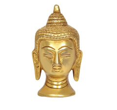 Brass Buddha head idol (3.5 in), symmetrical face with urna and long earlobes