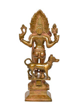Brass Kal Bhairava idol with bull figure, arms raised, decorative pedestal