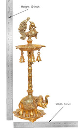 Measuring view: golden peacock diya stand, 19 in tall, 6 in wide, elephant base