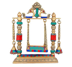 Decorative brass temple swing with Kirtimukha top, jeweled pillar bells