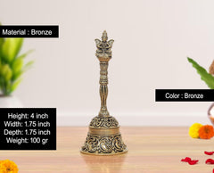 Bronze pooja bell with Garun on top; ridged stem and ornate base, 4 in high.