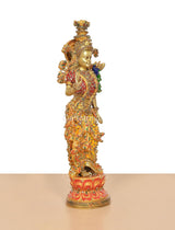 Radha Rani brass idol, detailed crown and flowing skirt with meenakari accents.