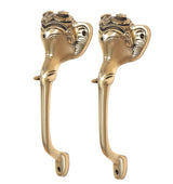 Golden brass Ganesha face door handles, side view with curved grip and base holes
