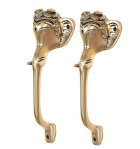 Golden brass Ganesha face door handles, side view with curved grip and base holes