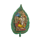Metal Panchmukhi Hanuman wall hanging close view of five faces in green leaf arch