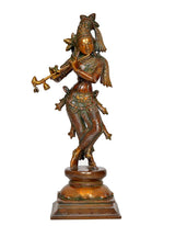 Standing Krishna brass figurine playing flute, detailed headgear, ornate carved base