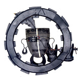 Back of metal Krishna wall hanging with dark circular ring and exposed wiring