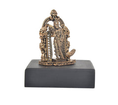 Bronze Murugan standing figurine with peacock tail detail and ornate frame, on square base